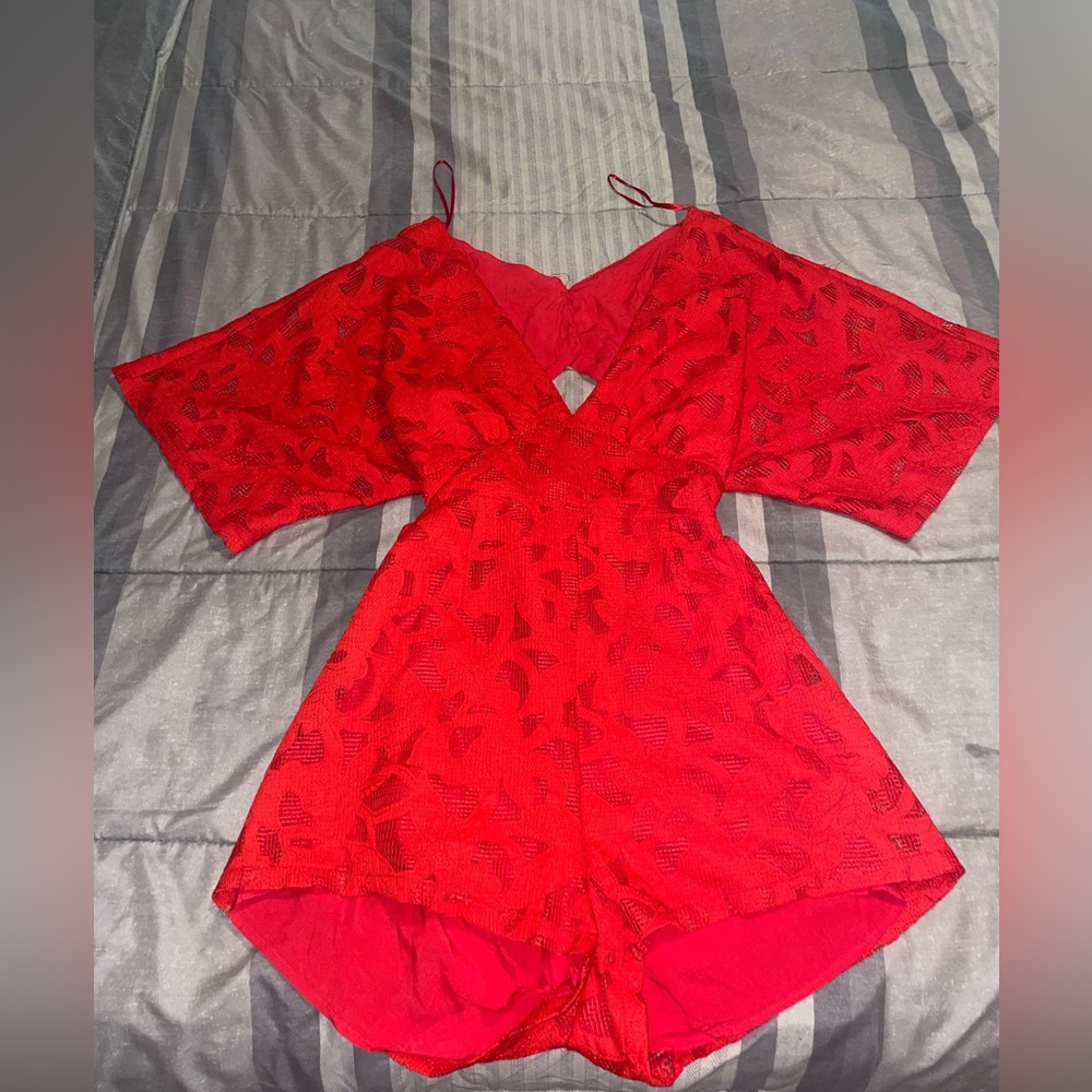 New romper never worn original price $70 selling it for $50 :)